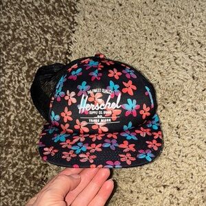 Herschel Supply Company Black and Pink Hat with chew marks on the back